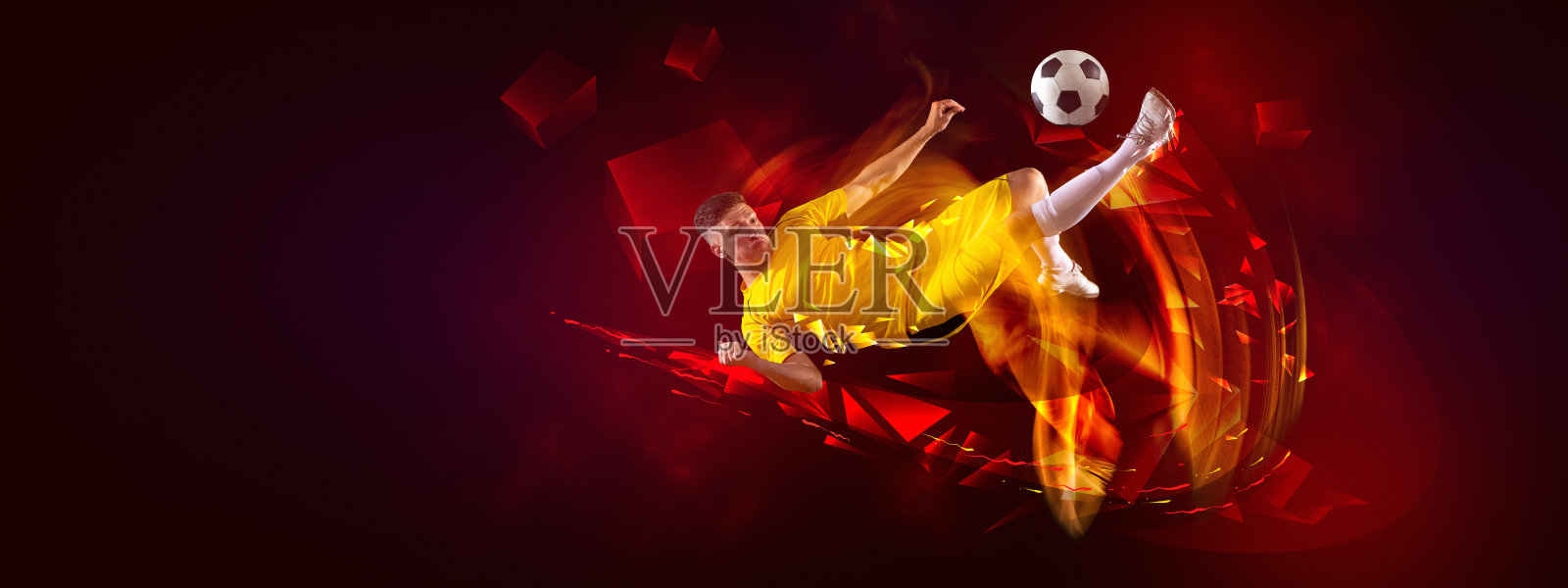 足球的创意艺术作品，足球运动员在运动和行动与球孤立在黑暗背景多边形和流体氖元素。艺术、创意、运动照片摄影图片