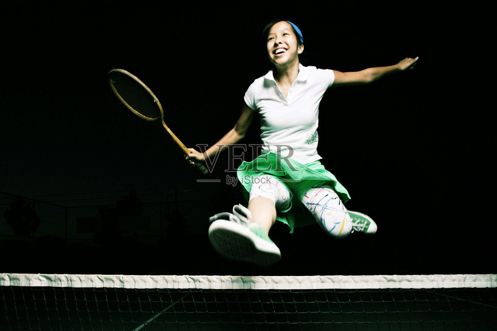 蹦极网球运动员照片摄影图片