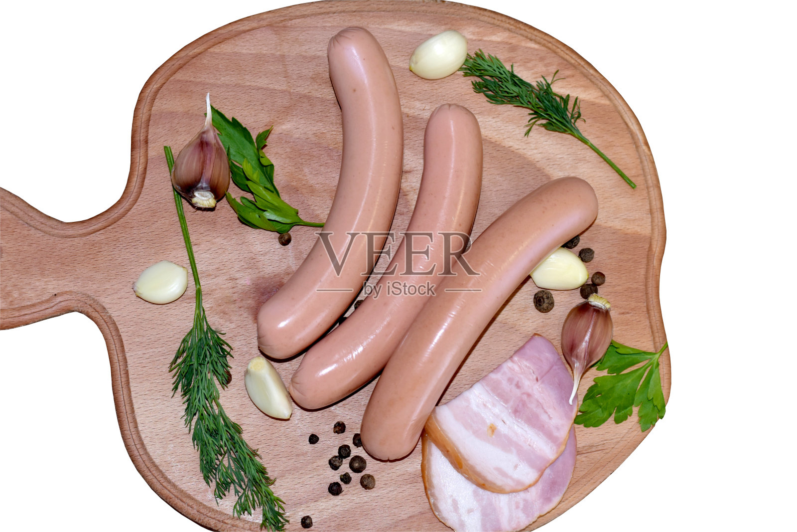 三根香肠在桌子上准备吃。照片摄影图片