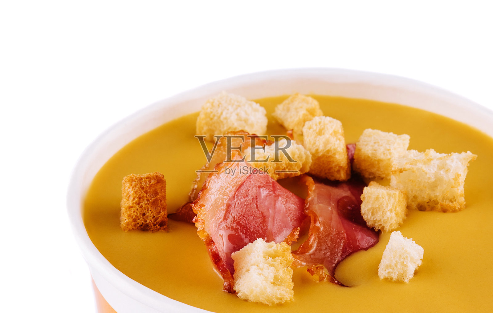 美味的奶油南瓜汤配上煎培根照片摄影图片