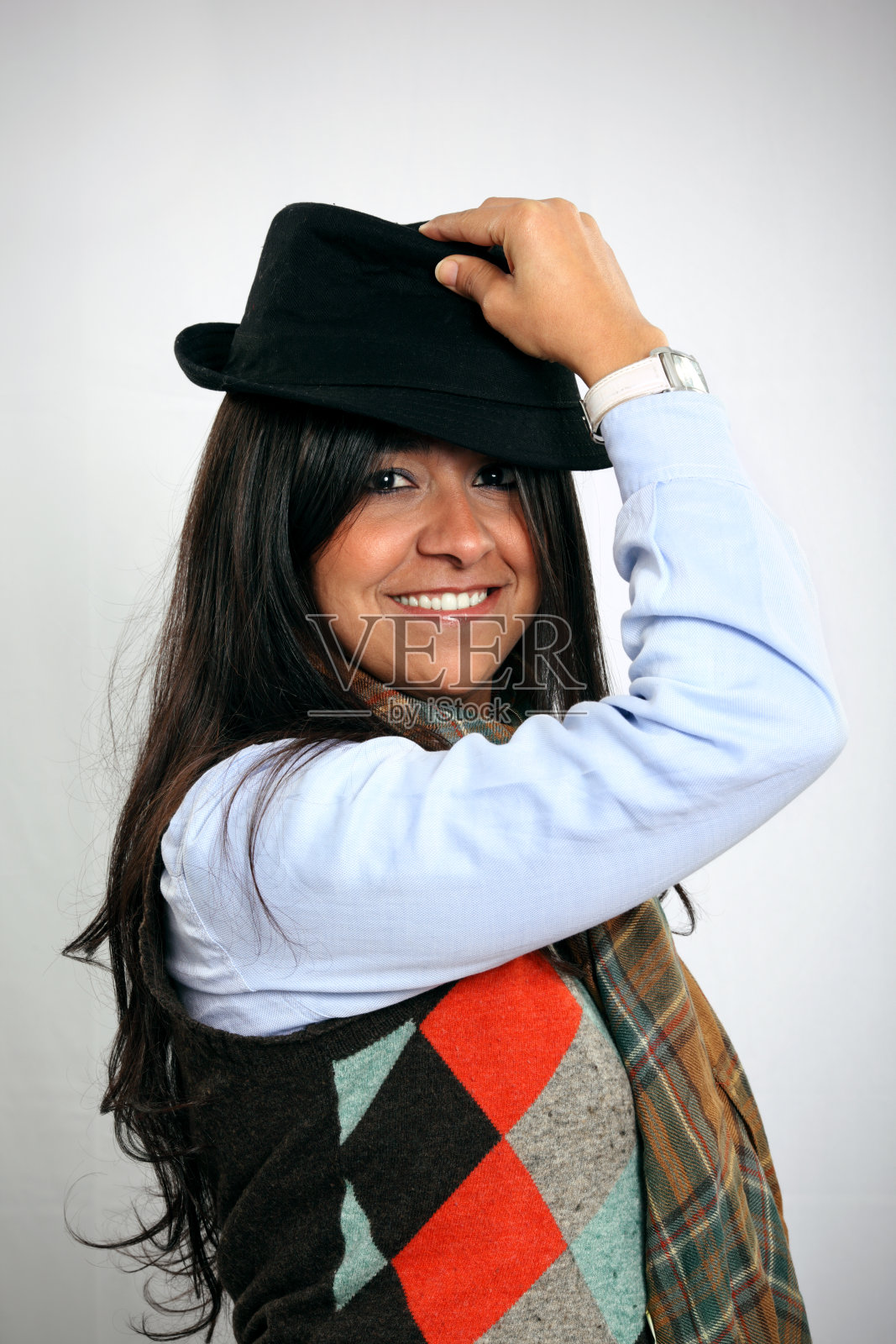 戴软呢帽的年轻女子照片摄影图片