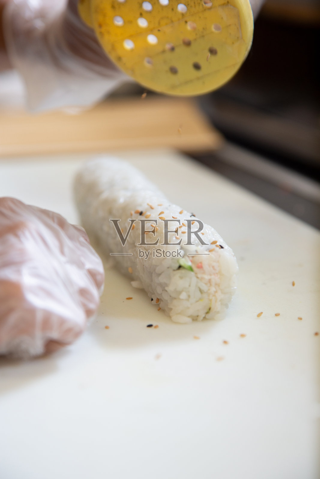 用手准备寿司照片摄影图片