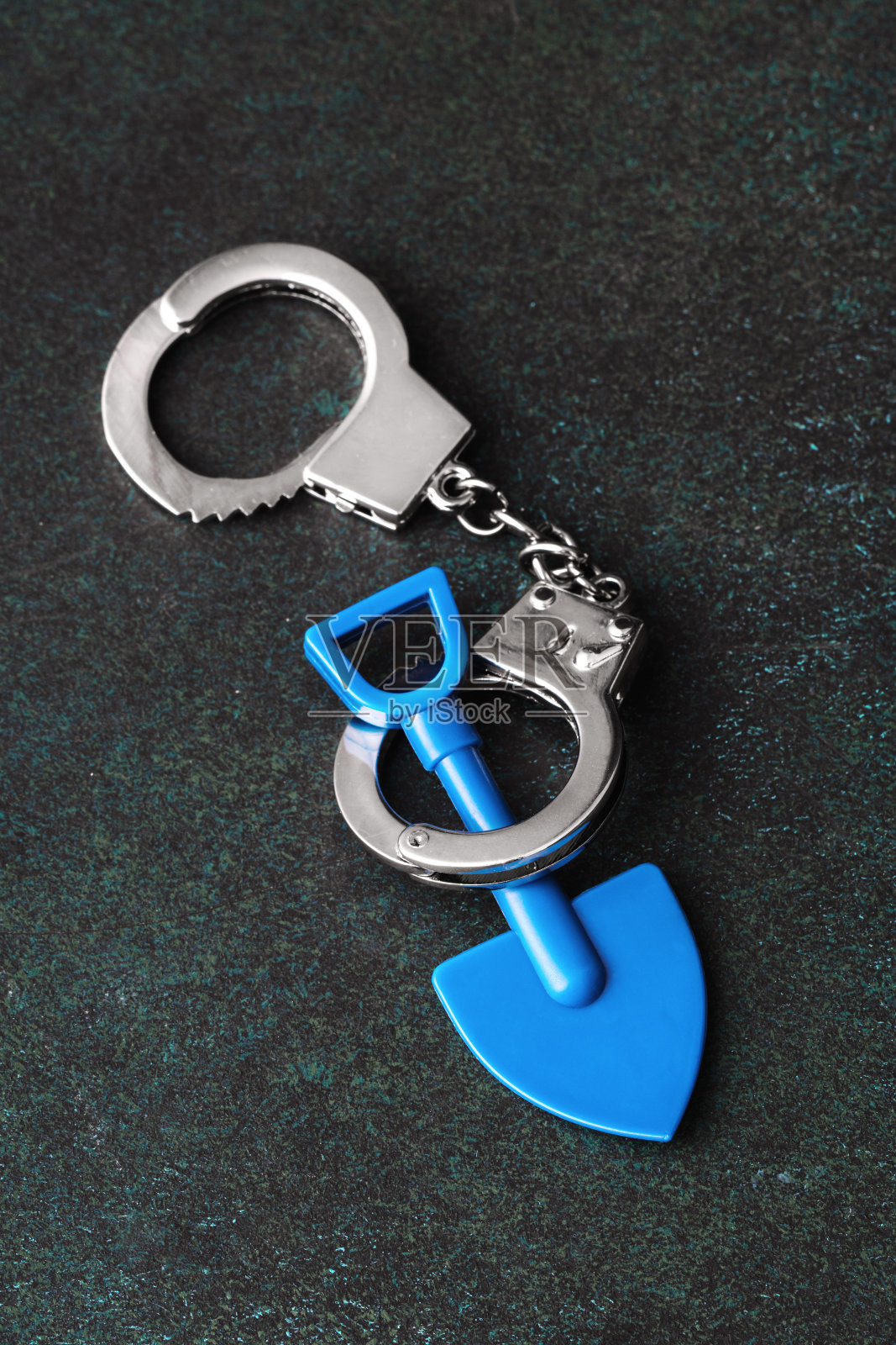 手铐与铲照片摄影图片