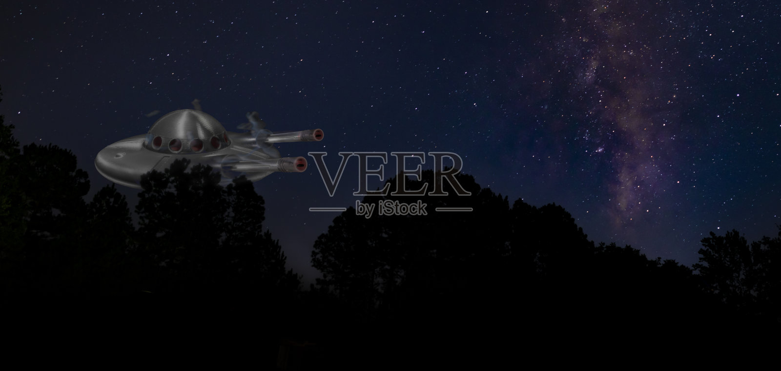 外星人准备用枪威胁绑架人类照片摄影图片