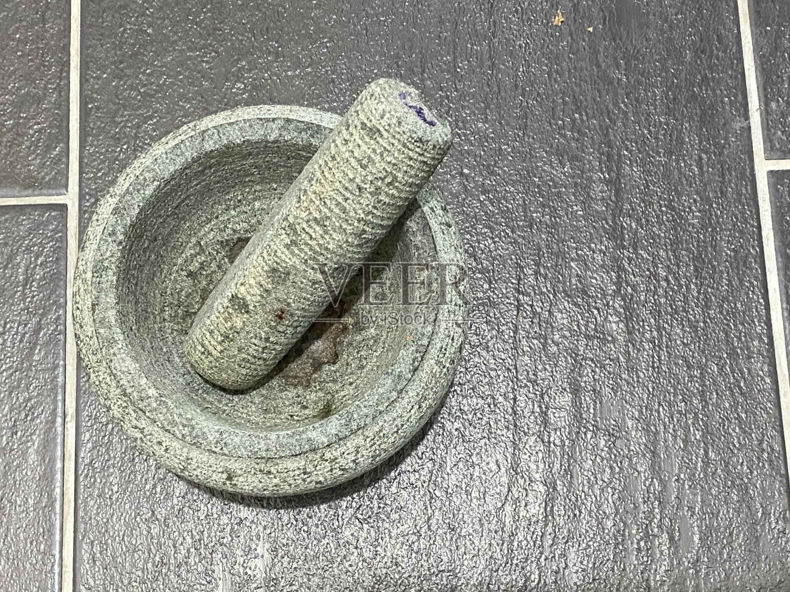 石臼和杵的俯视图照片摄影图片