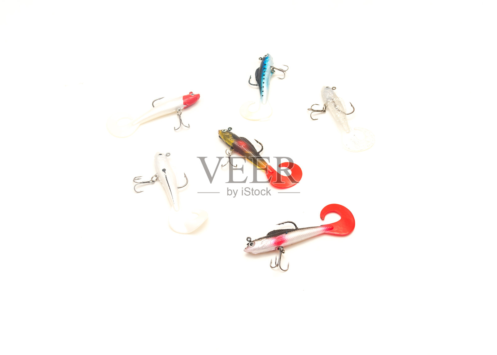 多个夹具头软鱼饵与大软尾巴孤立在白色照片摄影图片