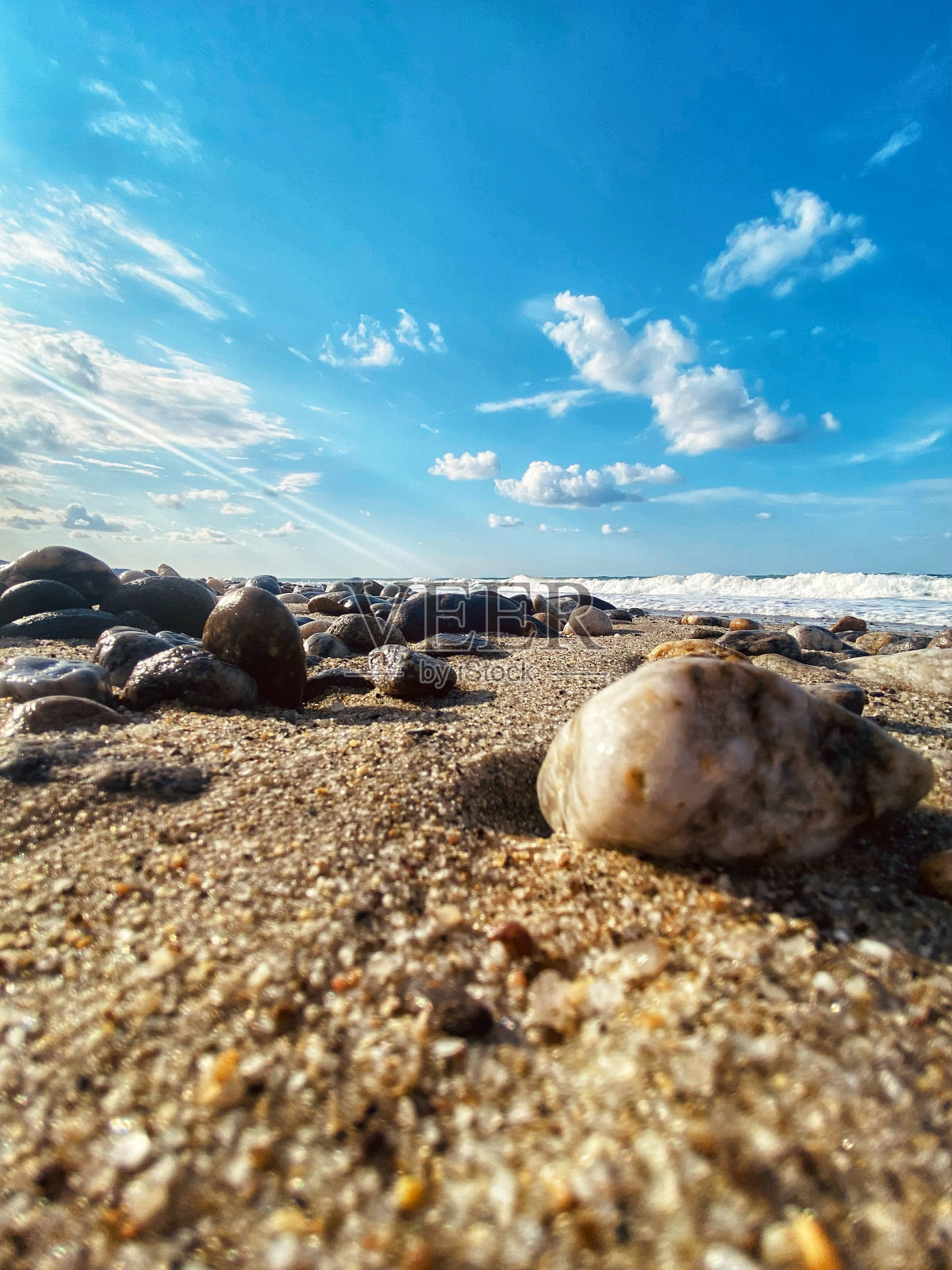 沙滩上的石头照片摄影图片