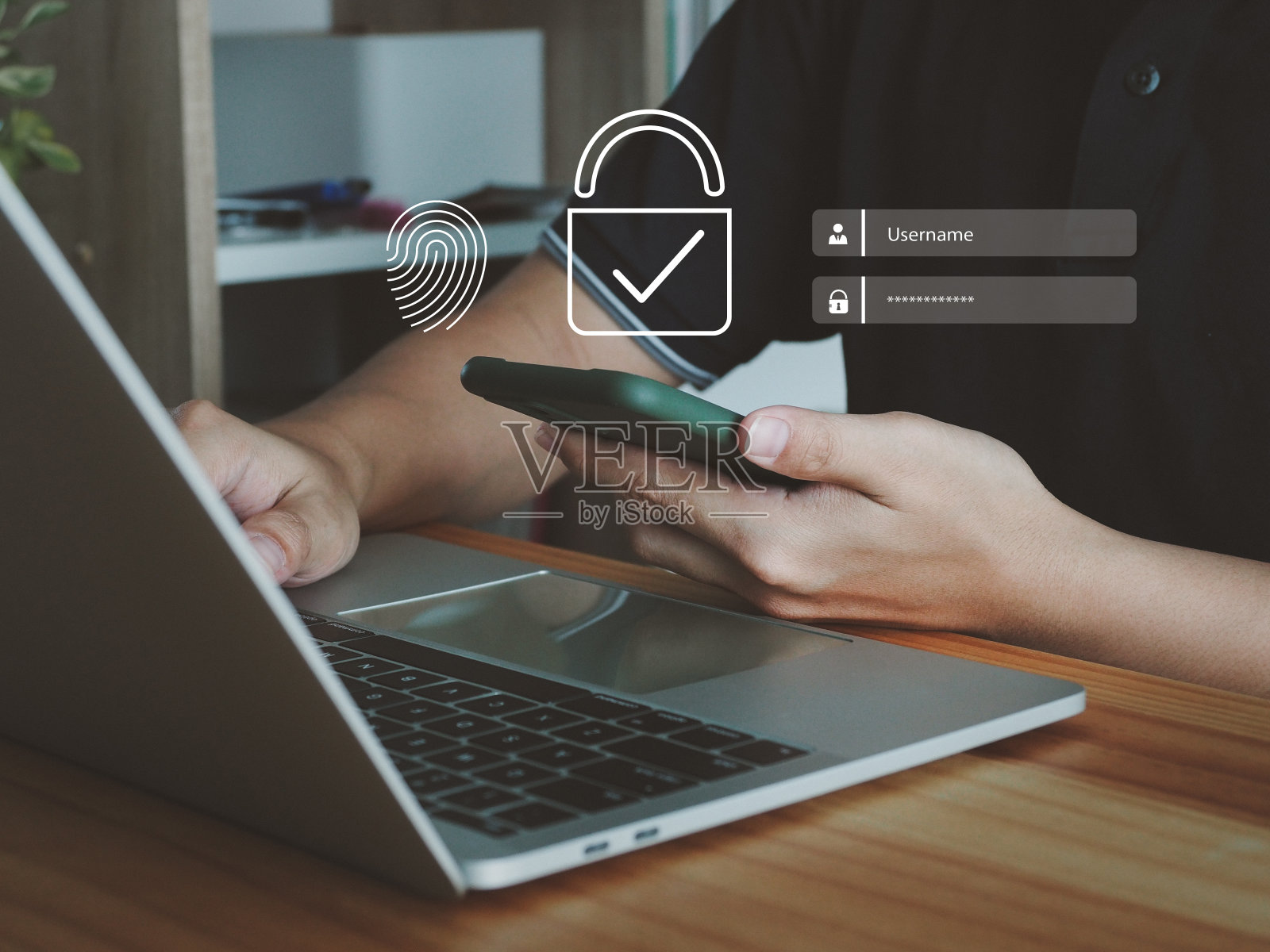 扫描你的指纹来验证你的身份和用户名和密码。照片摄影图片