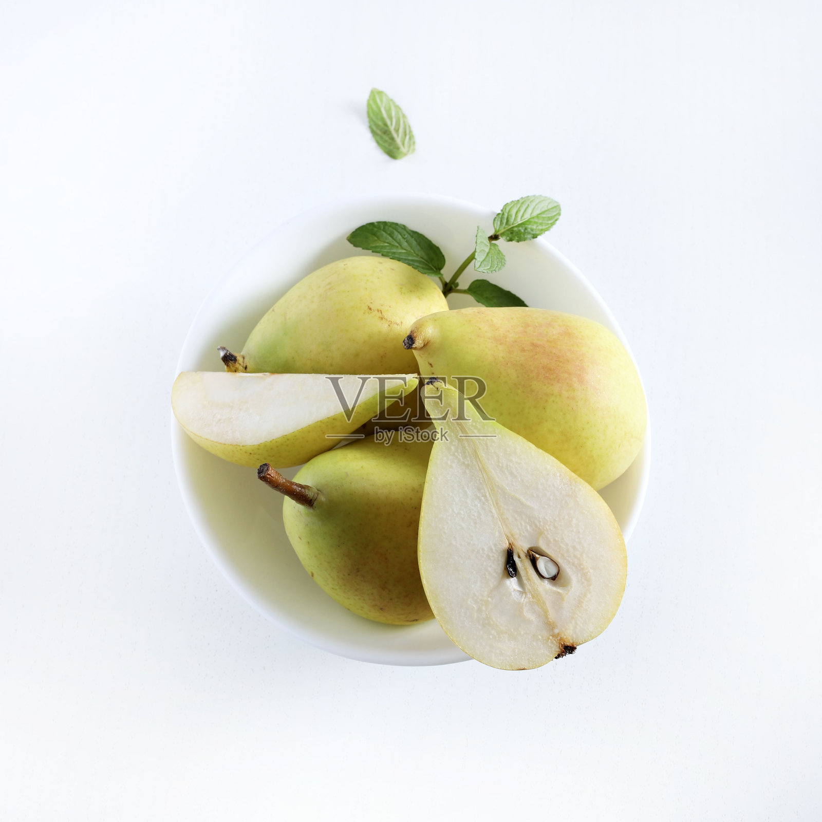 新鲜的黄梨。照片摄影图片