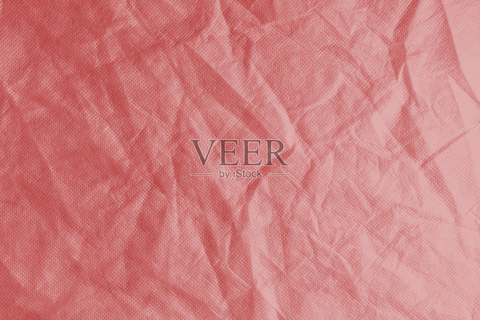 皱巴巴、皱巴巴的红色纺粘织物纹理背景照片摄影图片