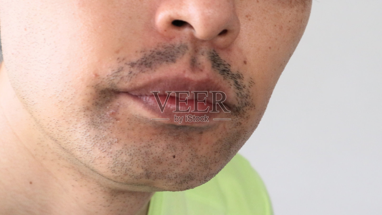 一个留着胡子的男人的特写照片摄影图片