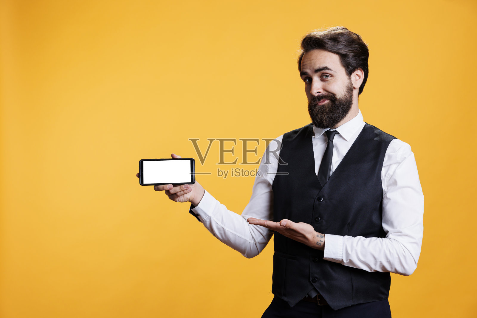 年轻的管家显示白色的显示照片摄影图片