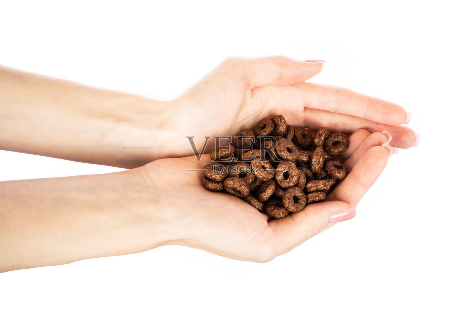 巧克力戒指不是手。快速的早餐。孤立在白色背景上。照片摄影图片