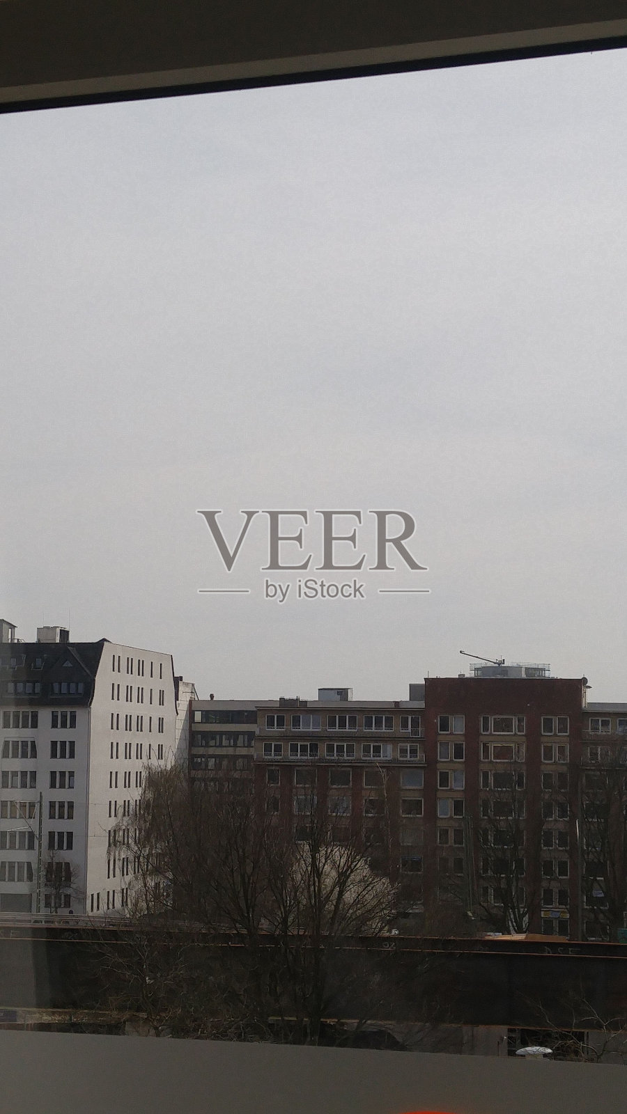 从窗口看到的城市风景照片照片摄影图片