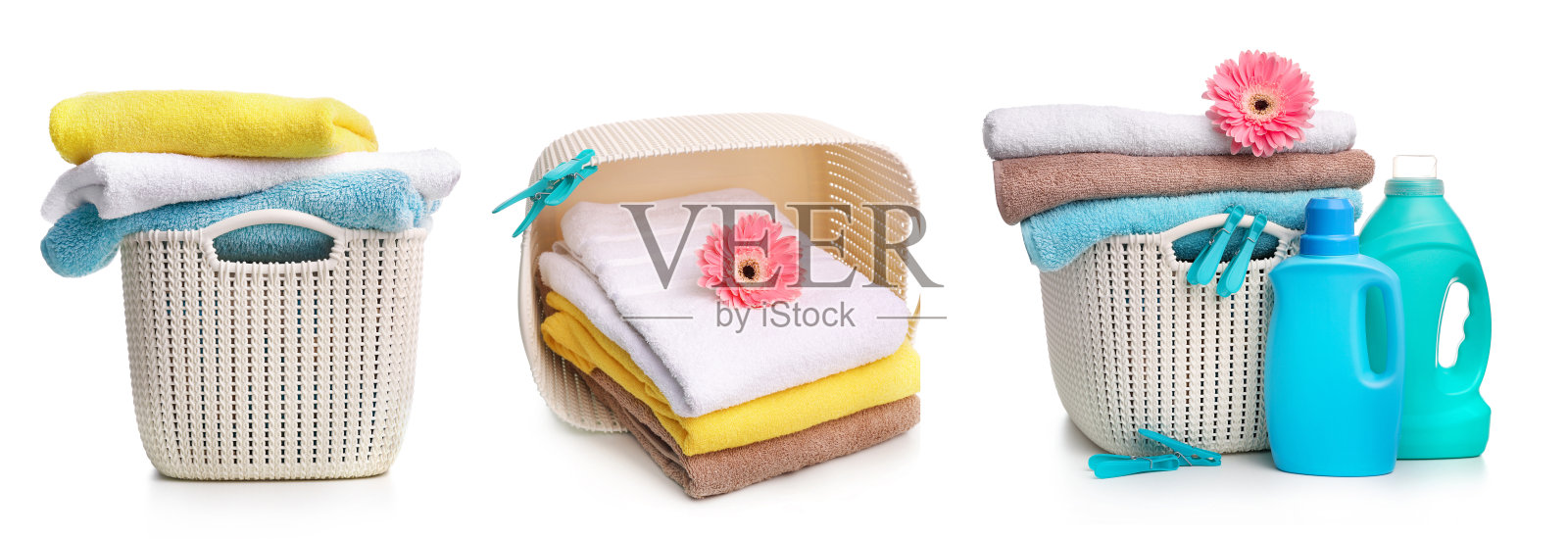 一套洗衣粉和毛巾孤立在白色背景。照片摄影图片