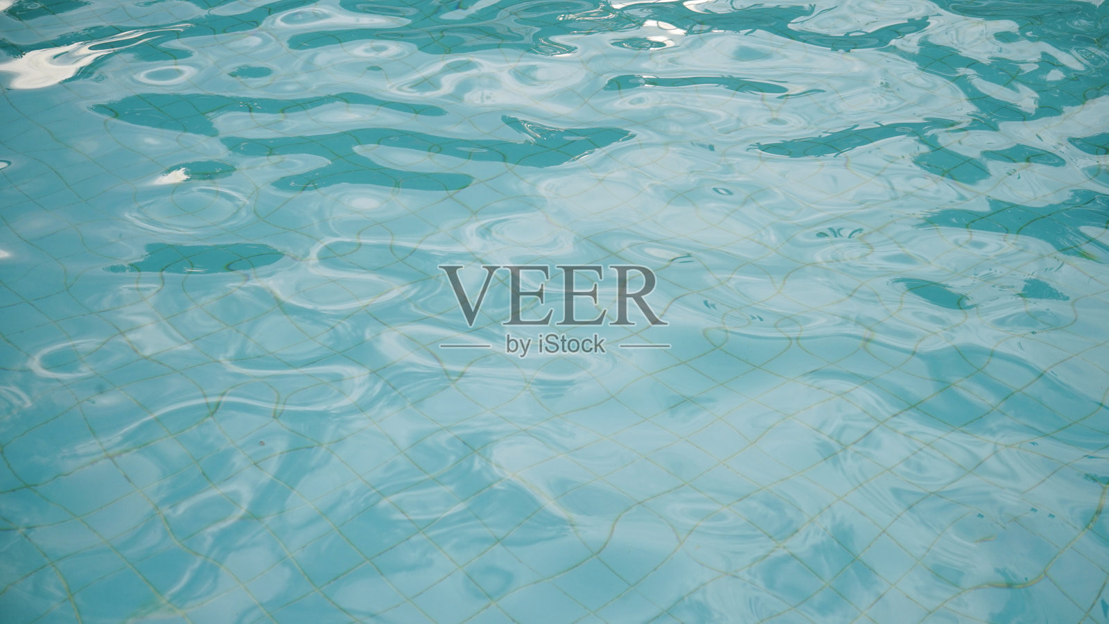 蓝色的水面。这是使用工作空间的背景照片摄影图片