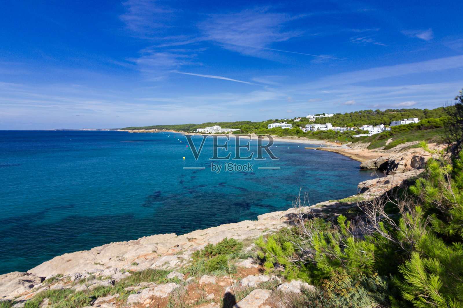西班牙梅诺卡岛的圣阿德奥达托海滩照片摄影图片