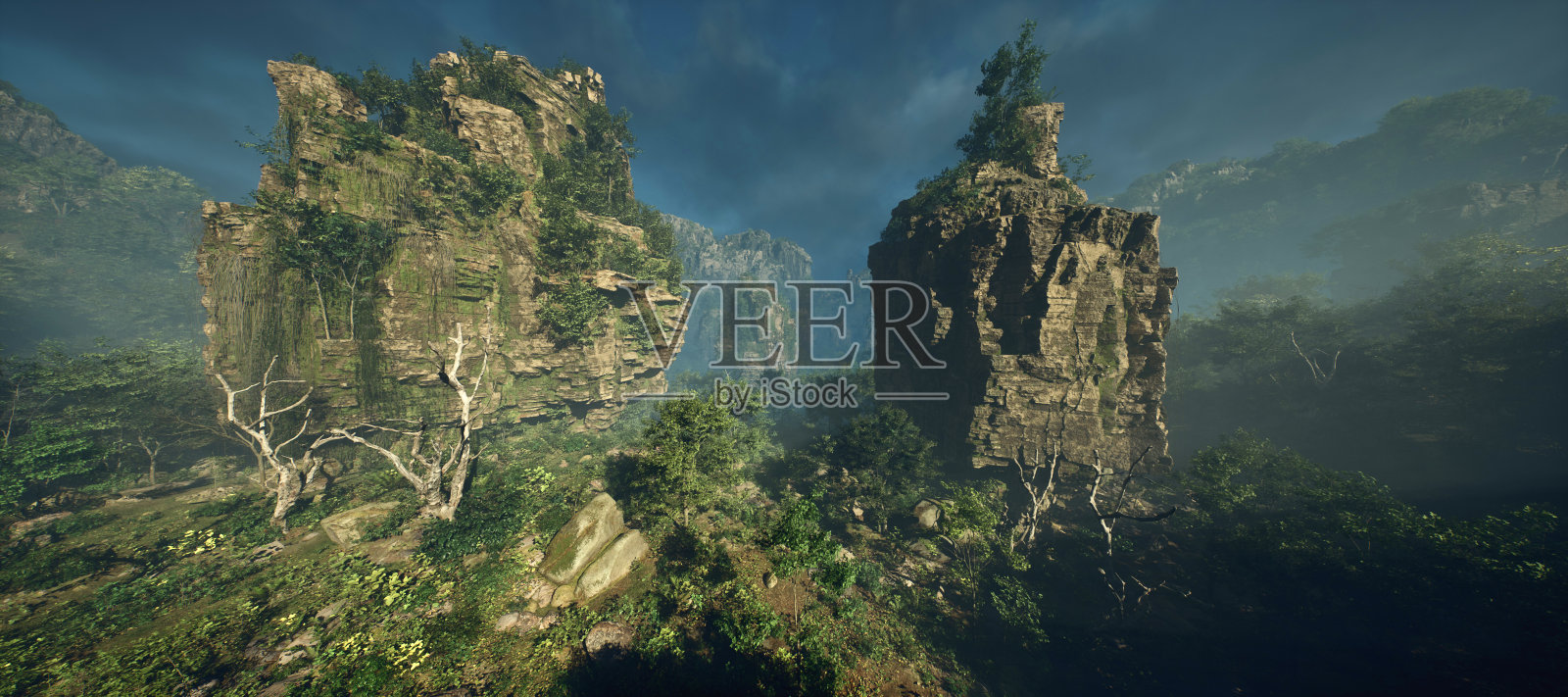 多云天空下的迷雾丛林和石柱。照片摄影图片