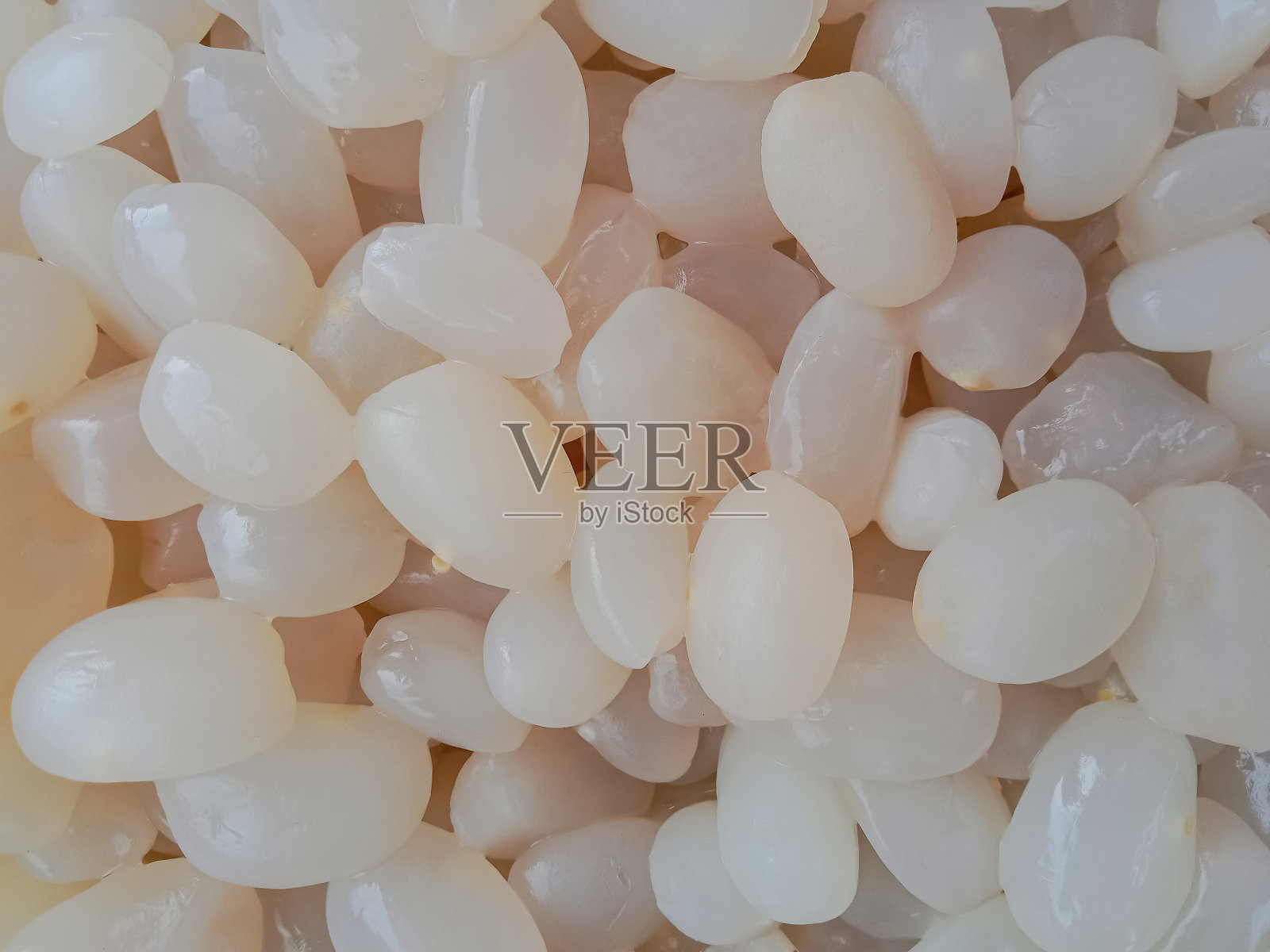 可朗加陵或糖棕榈果实。一堆糖棕榈果。糖棕榈果纹理背景。前视图。照片摄影图片