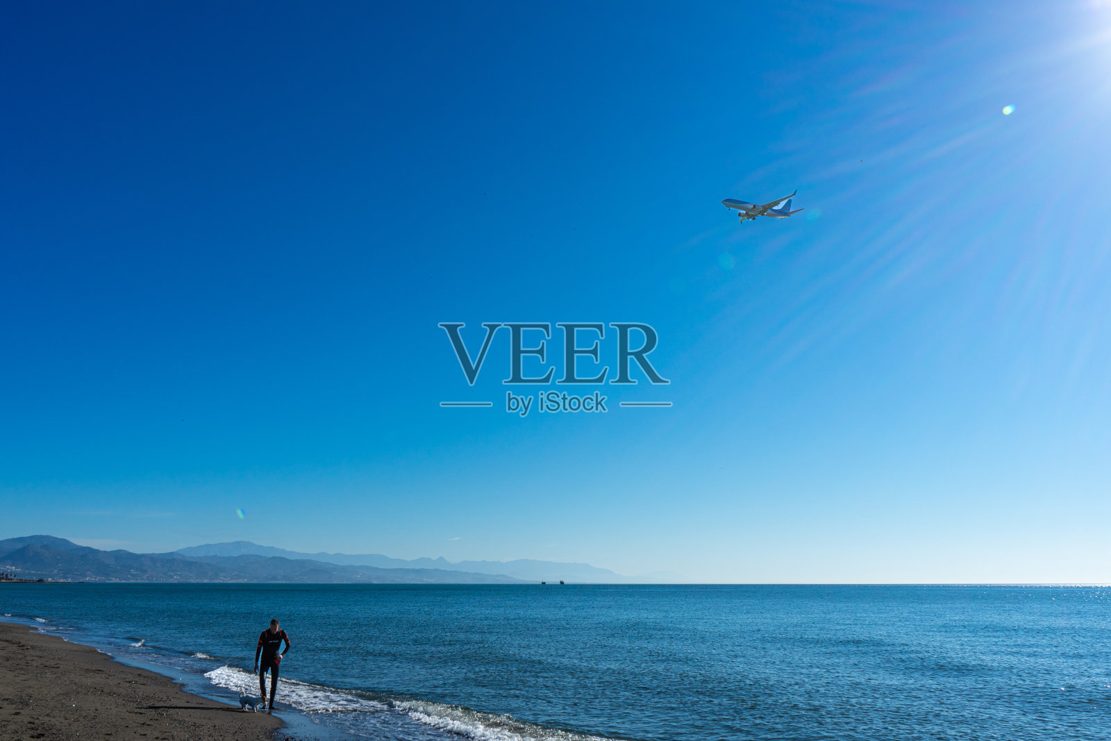 地中海上的日出，马拉加照片摄影图片