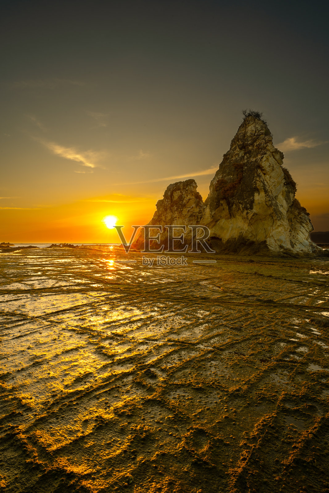 Tanjung Layar Sawarna海滩的日落照片摄影图片