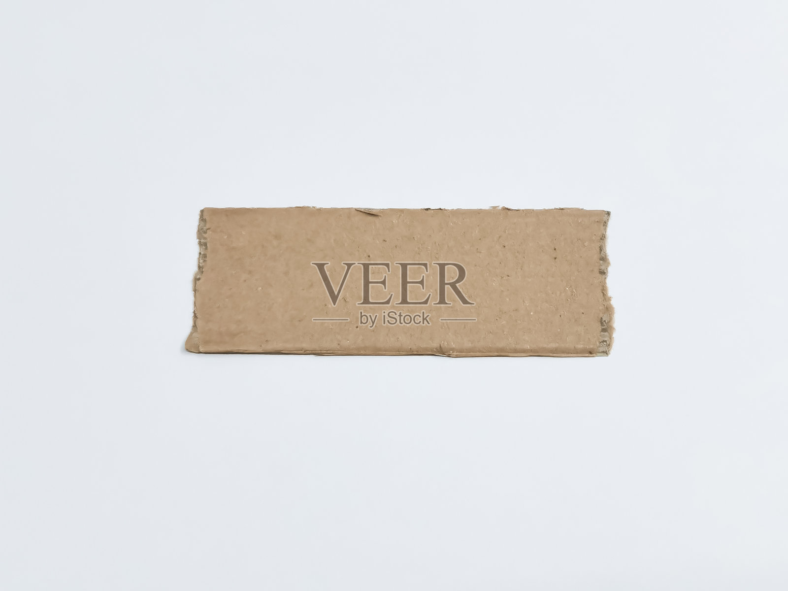 空白牛皮纸条片孤立在白色背景。照片摄影图片