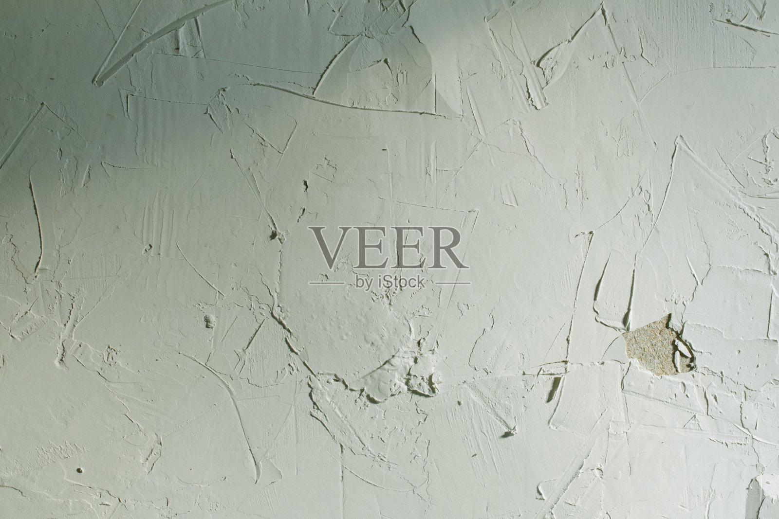 白色水泥表面旧背景，有裂缝照片摄影图片