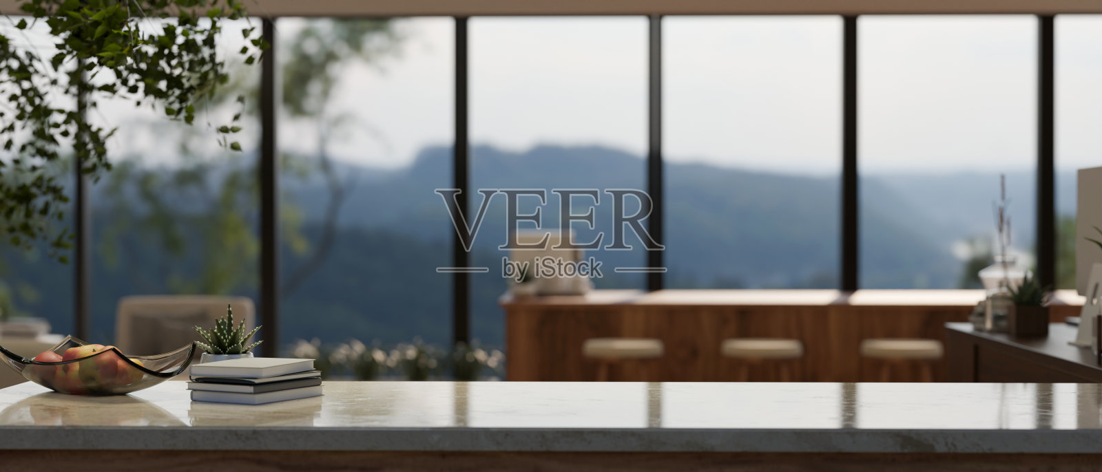 在一个带有木制吧台的模糊现代家庭休息室的台面上复制空间照片摄影图片