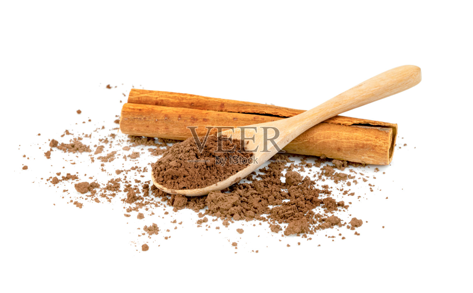 肉桂粉和木勺棍孤立在白色的背景照片摄影图片
