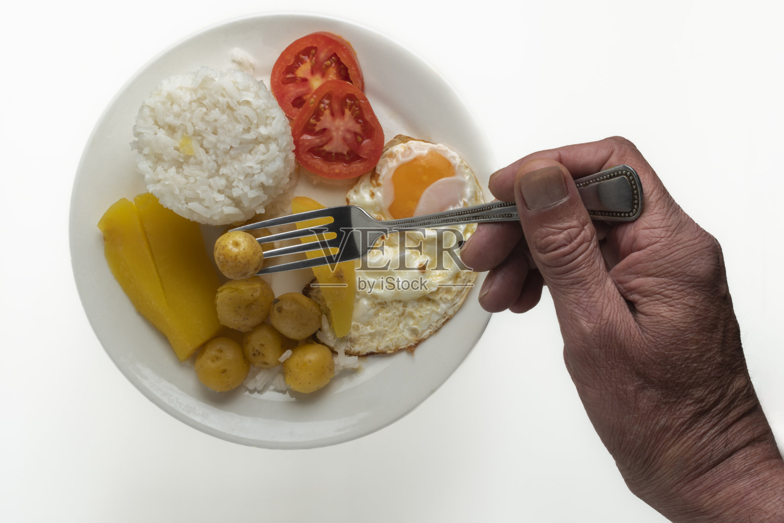 米饭，鸡蛋，西红柿，小土豆，午餐照片摄影图片