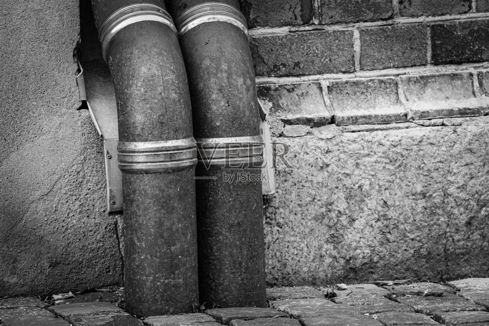 房子上的水管照片摄影图片