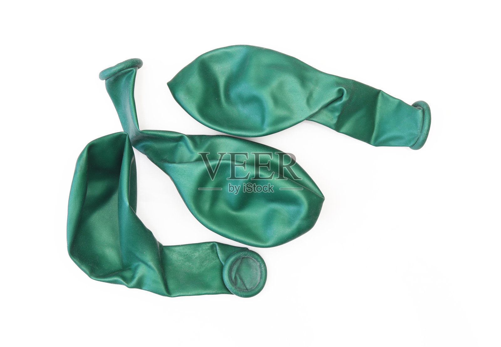 三个泄气的装饰性绿色气球孤立在白色背景上照片摄影图片