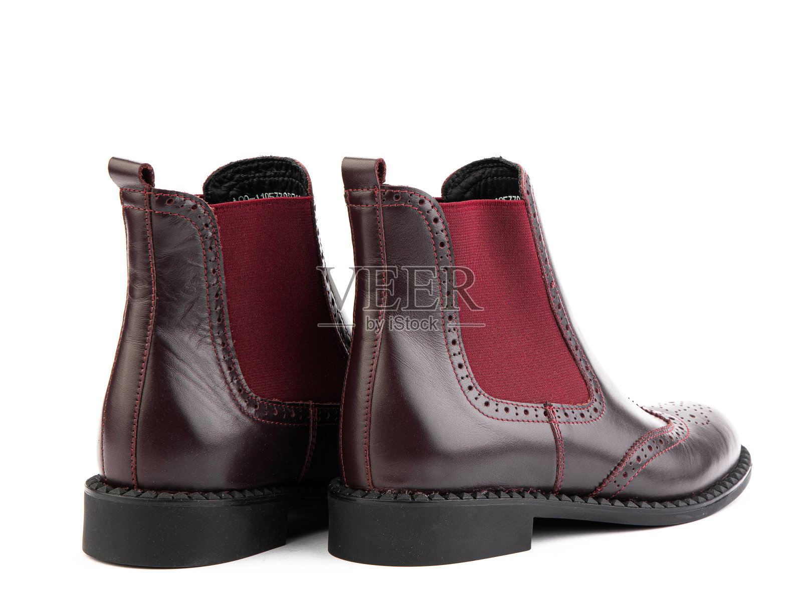 女子秋季切尔西红皮靴孤立白色背景。背面视图。时尚的鞋。为鞋店概念拍照照片摄影图片