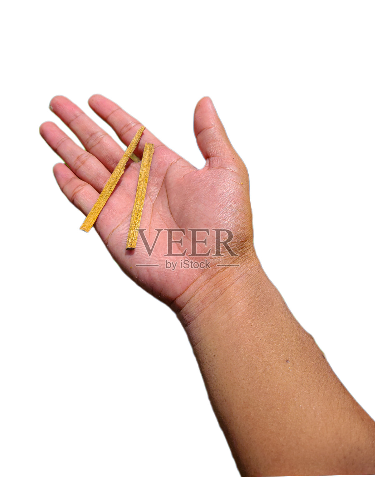 手上的一块木头照片摄影图片