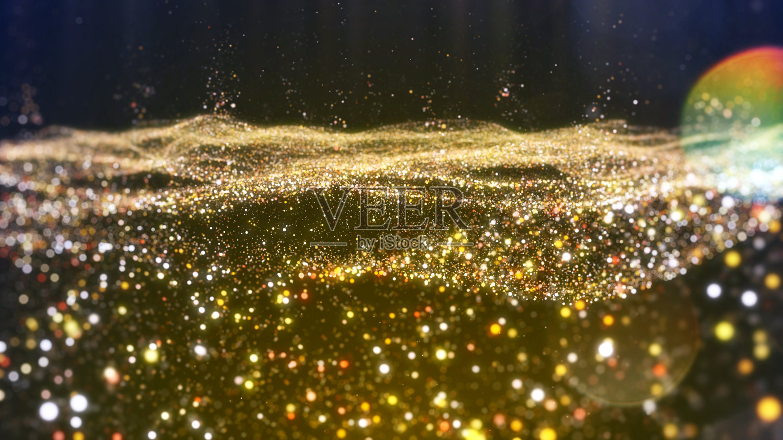 金色颗粒飘逸抽象的背景照片摄影图片