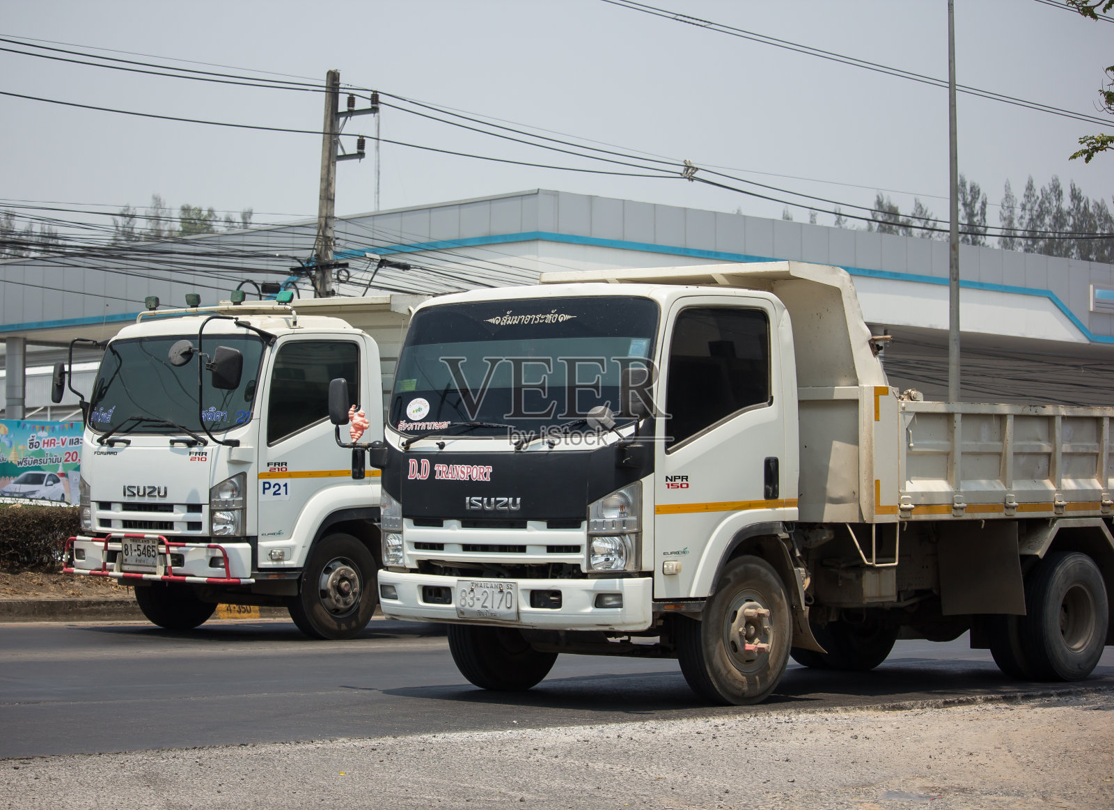 私人五十铃倾卸卡车。照片摄影图片