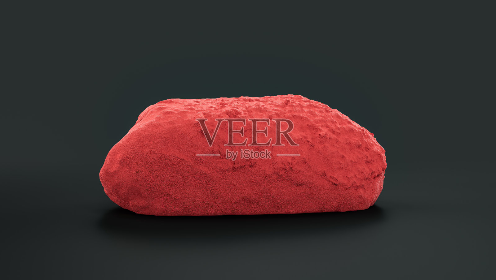 红色岩石上深色背景的单色岩石模型照片摄影图片