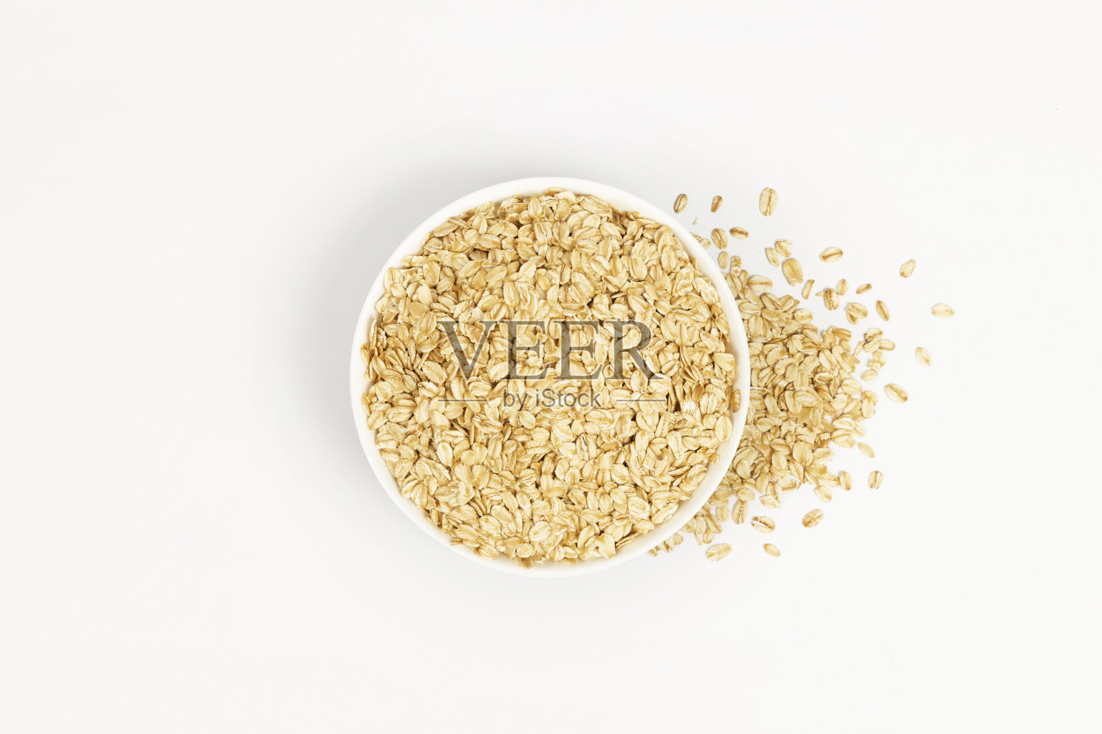 麦穗旁边的燕麦碗照片摄影图片