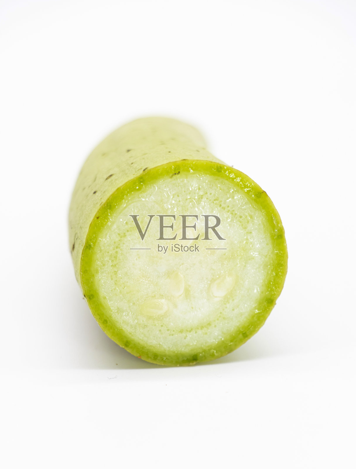 新鲜丝瓜或丝瓜收起来，选择性集中照片摄影图片