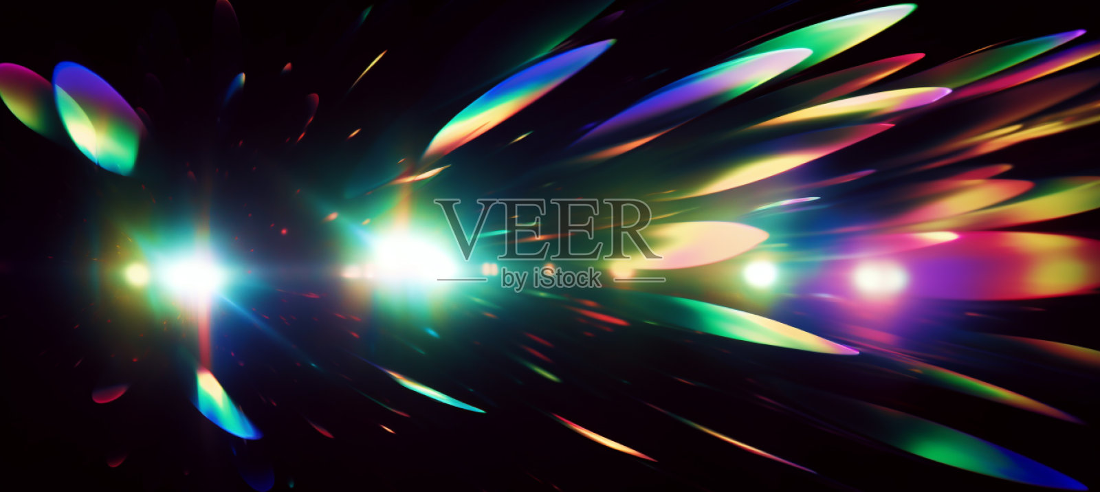 闪闪发光的彩虹色镜头光晕。光的效果照片摄影图片