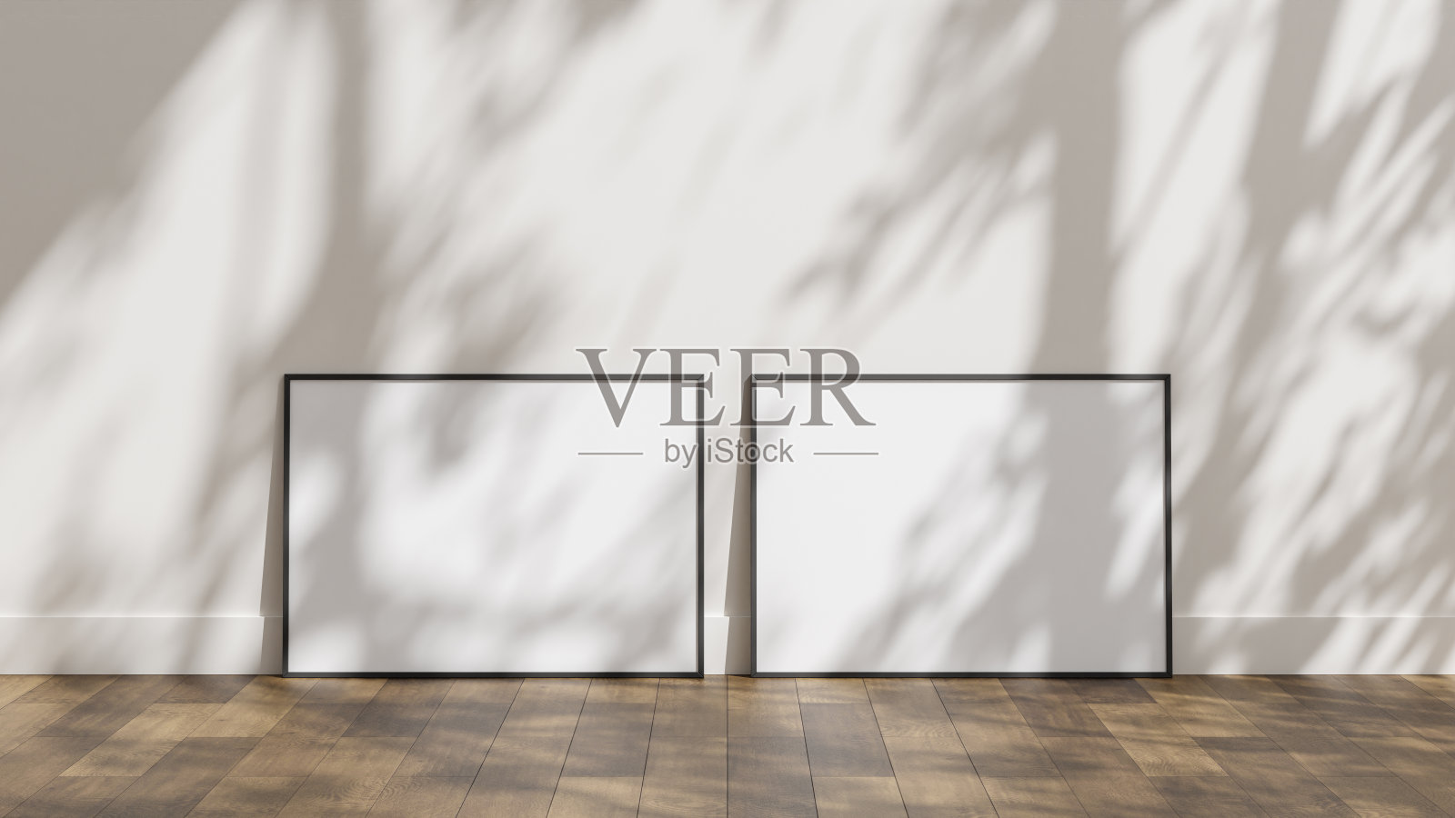 相框模型靠墙在木地板上照片摄影图片