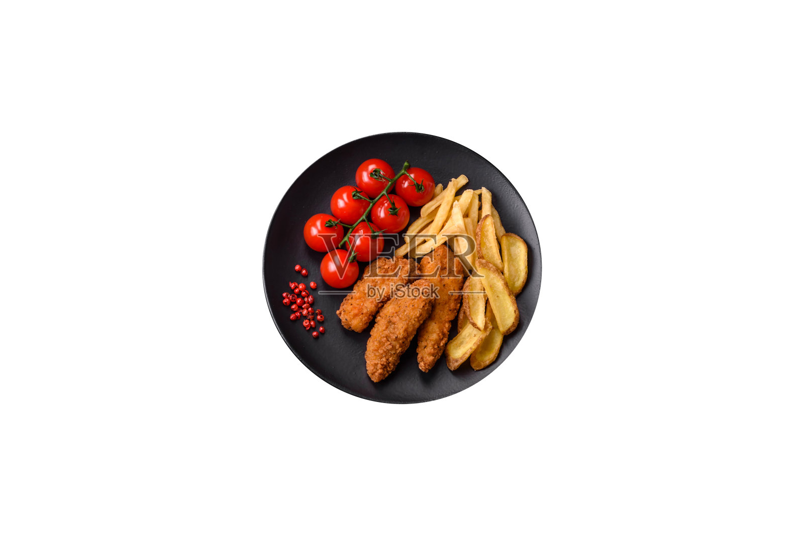 美味酥脆的鸡块，撒上盐和香料照片摄影图片