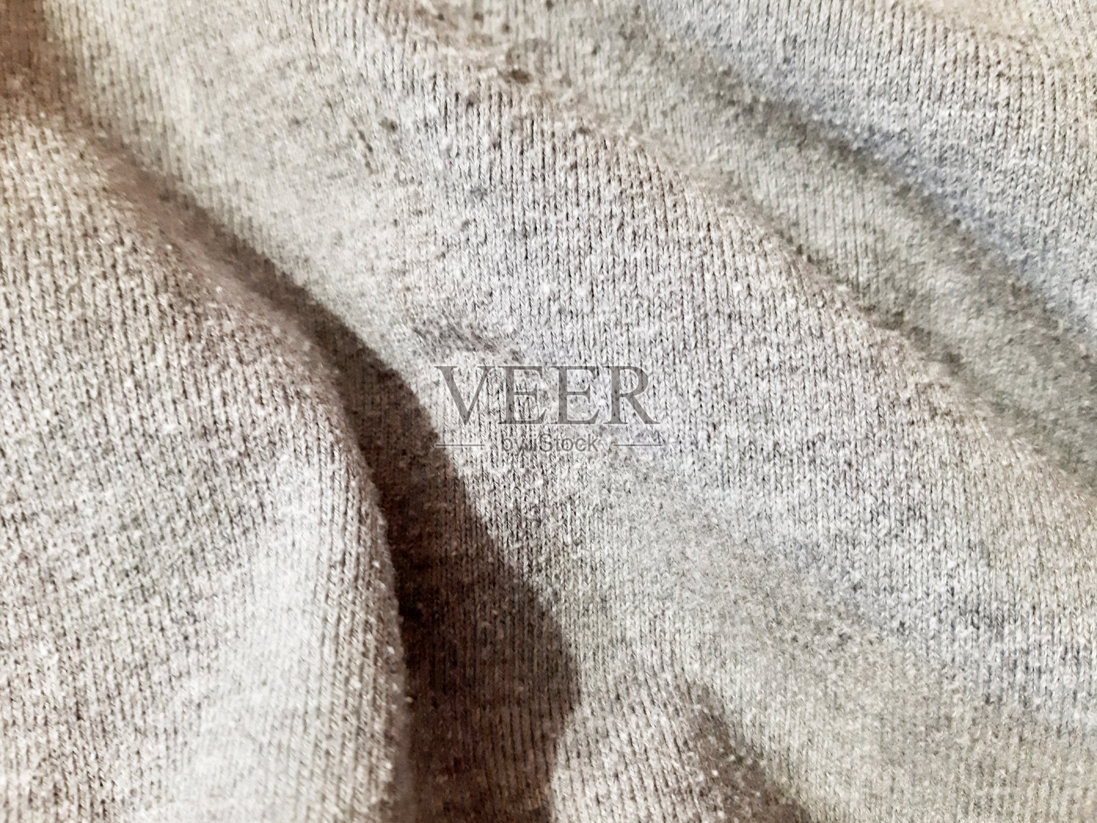 灰色保暖针织材料。背景设计，摄影。纺织，面料模板，现代照片摄影图片