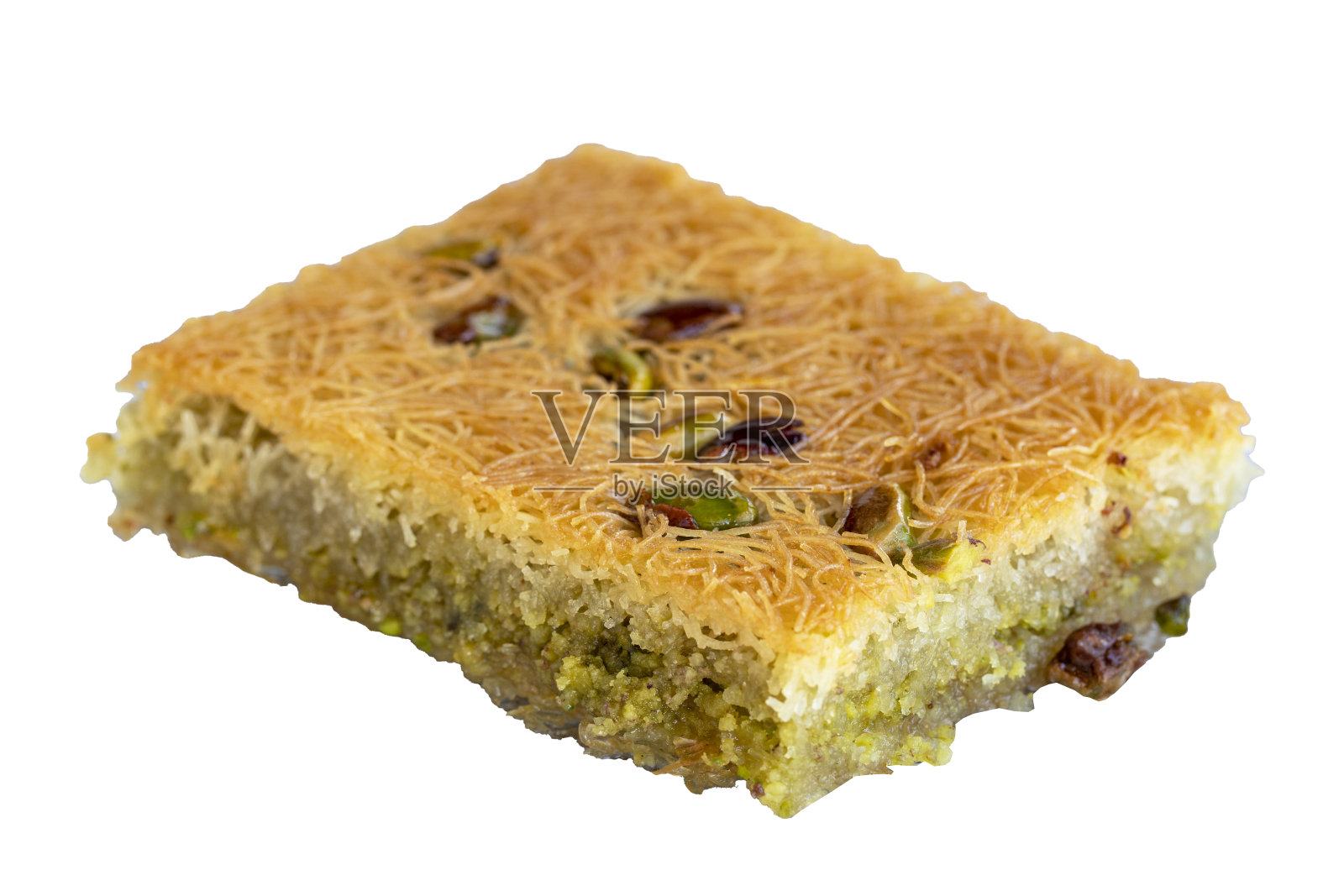 开心果卡达伊夫甜点。传统的地中海美食佳肴。卡达伊夫孤立在白色背景上。近距离照片摄影图片