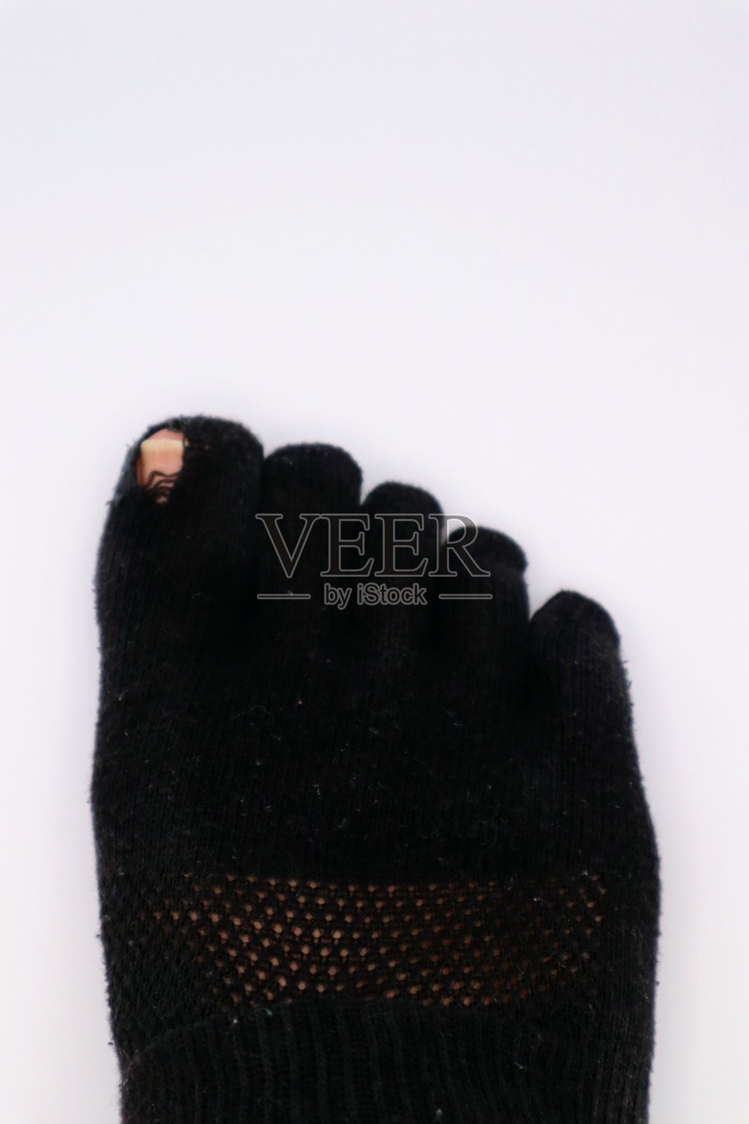 有洞的袜子特写照片摄影图片