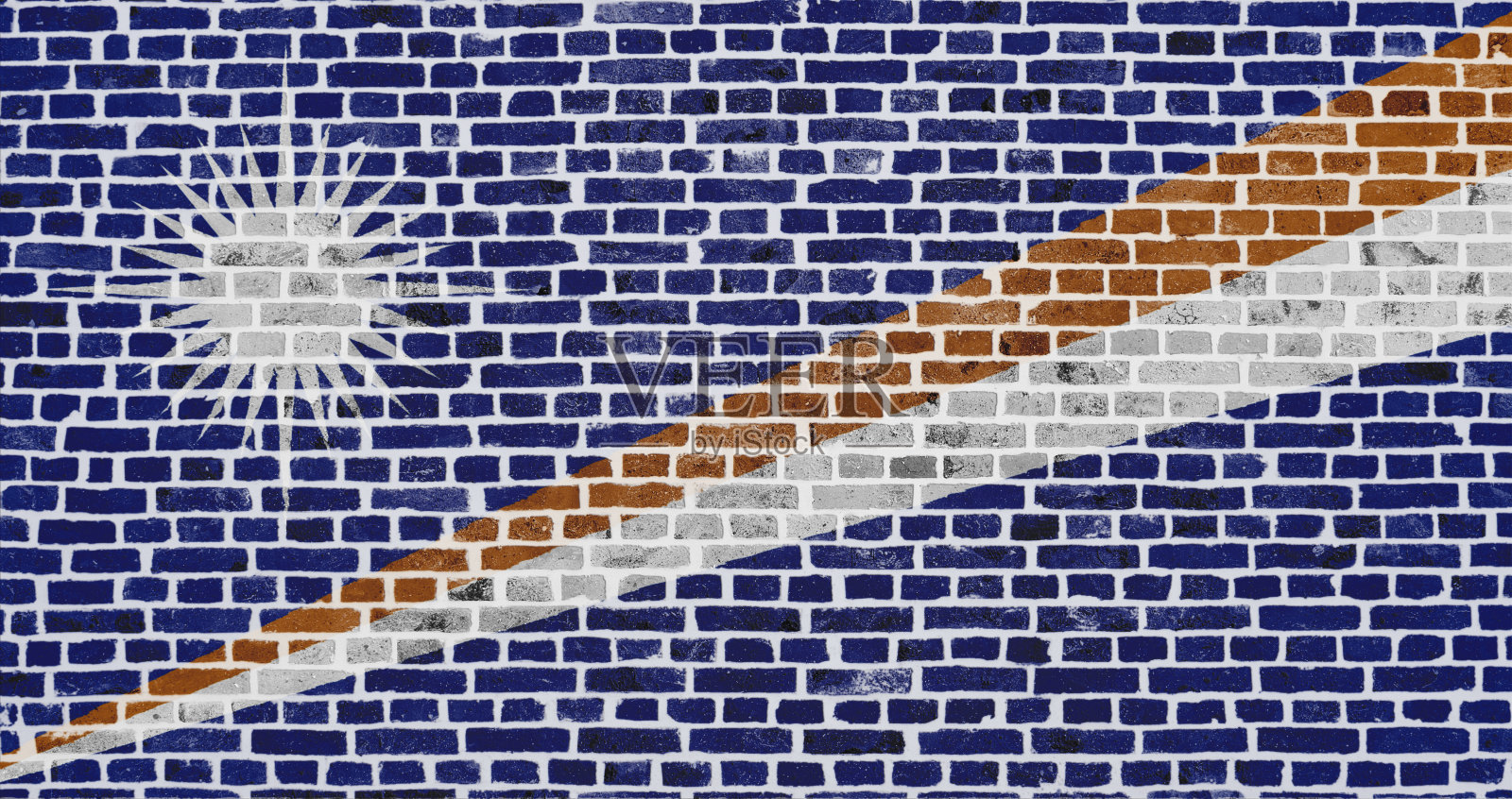 在砖墙上画着马绍尔群岛的国旗照片摄影图片