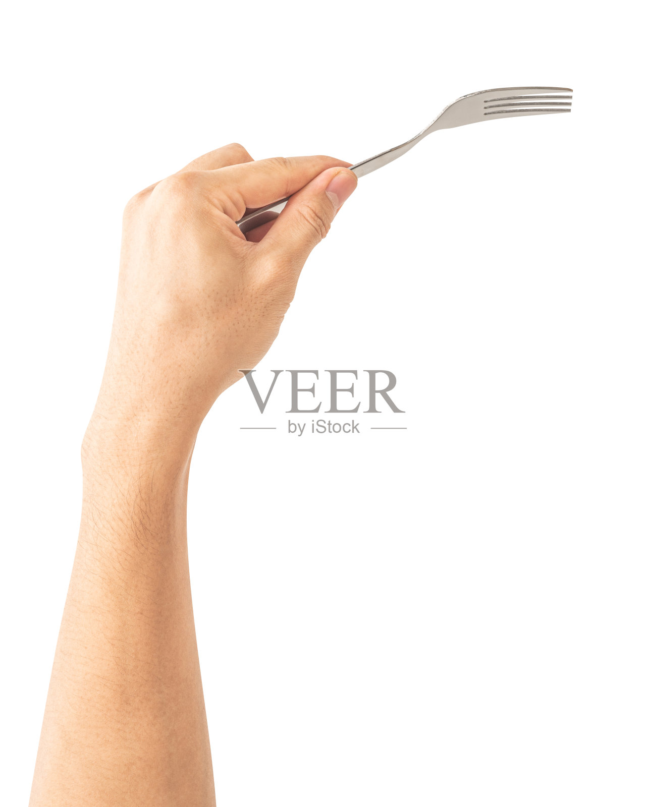 一个男人手里拿着一把银色的钢叉。照片摄影图片