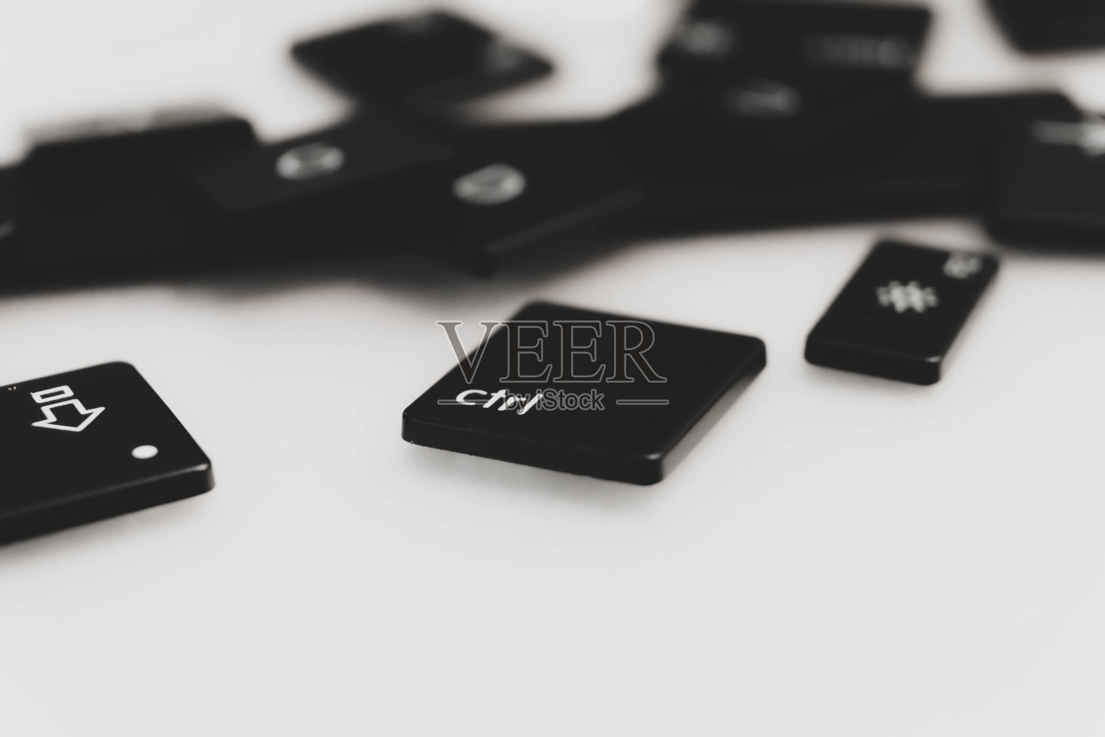 键系列(16)-苹果Mac Windows混合键背景散焦与Ctrl控制在前景-近距离键盘松散的键照片摄影图片