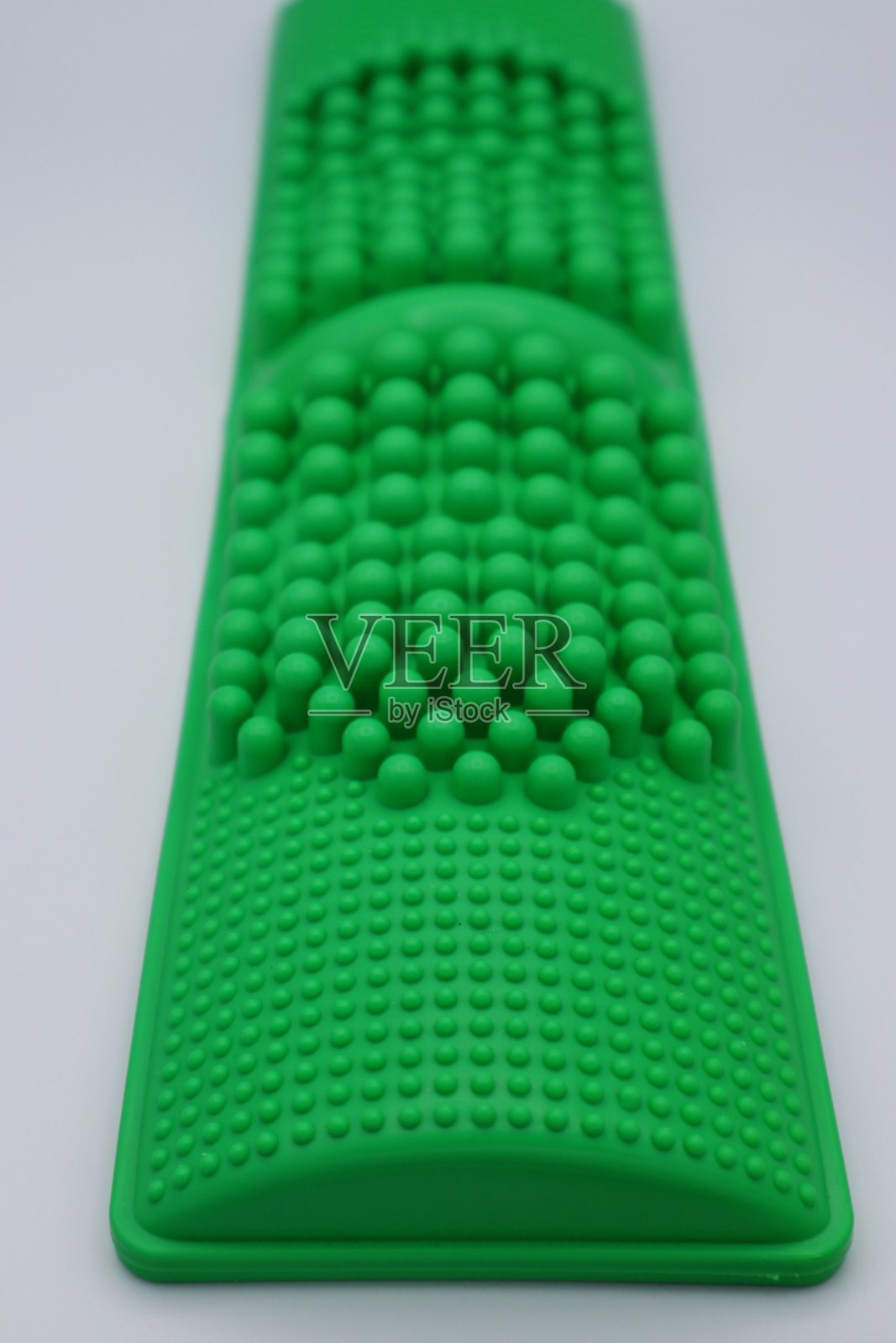 竹制足底按摩板特写照片摄影图片