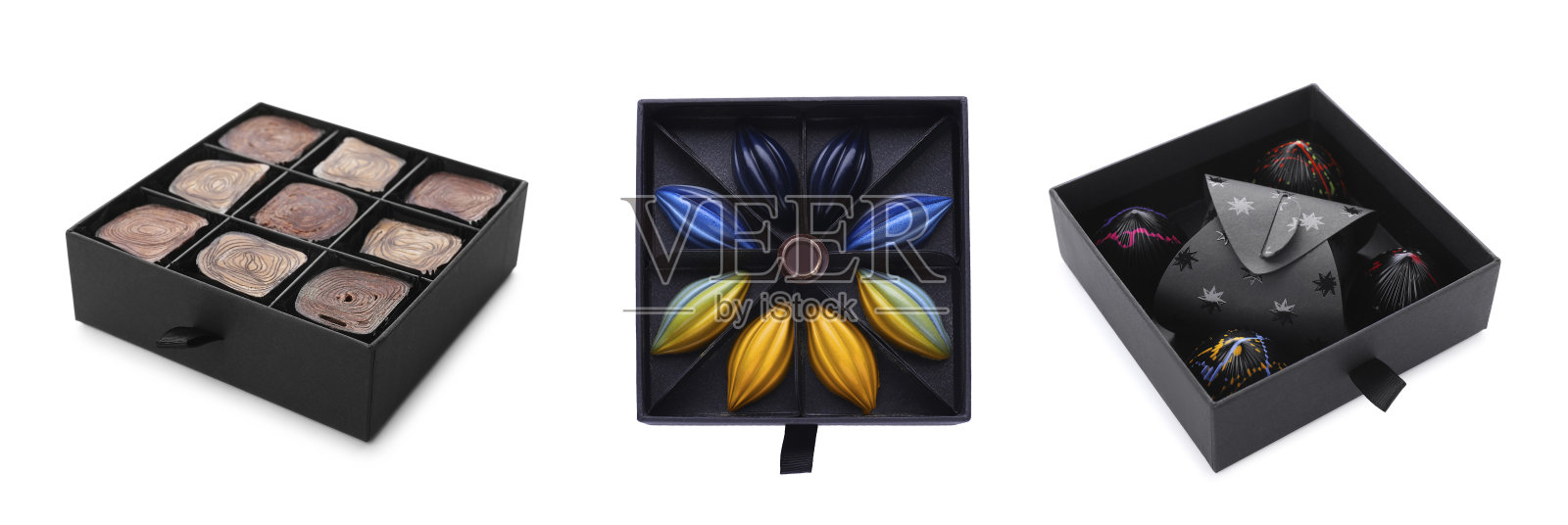 盒装不同口味的巧克力糖果，白色背景，拼贴设计照片摄影图片